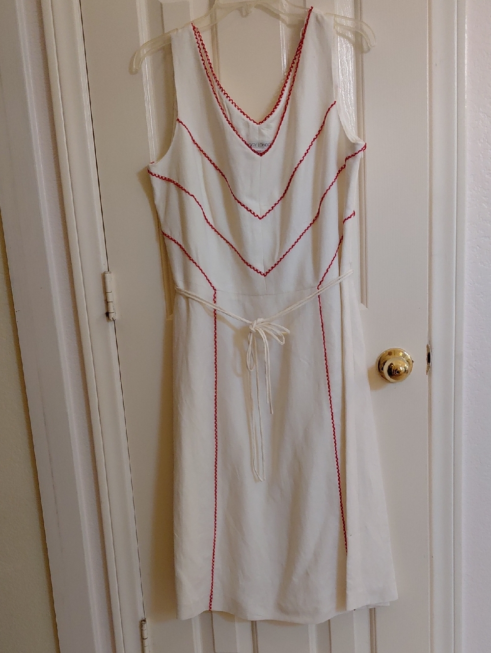 Maggie London White Sleeveless Dress with Red Stitch Detailing and V Neck